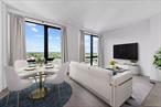 This one-bedroom, one-bath residence at 107-06 Queens Boulevard #10E, located in the prestigious BLVD Condominiums in the heart of Forest Hills, offers a sophisticated blend of modern luxury, elegant design, and unmatched convenience. Sun-filled and inviting, the home features expansive windows that flood the space with natural light, a gourmet kitchen with Bosch appliances, marble countertops, and custom cabinetry, and a spa-inspired bathroom adorned with Carrara marble and premium fixtures. Oak flooring, an in-unit Bosch washer and dryer, and refined finishes throughout create a polished, welcoming atmosphere.The BLVD Condominiums provide an array of lifestyle amenities, including an elegant lobby with a virtual doorman and package room, a fully furnished residentsâ€™ lounge with a full kitchen and direct access to a landscaped courtyard with BBQ areas, a childrenâ€™s playroom, a state-of-the-art fitness center, a business center with private conference room, and on-site parking.Perfectly positioned between 70th and 71st Avenues, the building sits across from the tranquil MacDonald Park and is just steps from Austin Streetâ€™s vibrant mix of restaurants, cafes, and boutiques. Commuters will appreciate the unbeatable transit accessâ€”only moments from the Forest Hillsâ€“71st Avenue subway station serving the E, F, M, and R lines, and a short walk to the Forest Hills LIRR station with express service to Manhattan in about 14 minutes. Multiple bus routes, including the Q23, Q60, Q64, and QM express lines, are also nearby, ensuring seamless travel throughout the city.Unit 10E at BLVD is more than just a homeâ€”itâ€™s a luxurious urban retreat with every comfort, convenience, and connection at your fingertips.