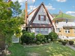 Traditional Tudor Style Home in the Heart of the Village! Living room with fireplace, Formal dining room, sunroom or den, study or office, half bath, and Eat-in-Kitchen on the first floor. 3 bedrooms and full bath on the 2nd floor. Walk up attic. Basement with egress window. 1 car garage. Donâ€™t miss this one!
