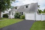 Compelling opportunity in Oceanside. This 3 bedroom, 2 bathroom home is turn key. Cape-cod on a 60x100 lot with 1, 319SF. Floor plan on the first floor consists of substantial living room/dining room combination, full bedroom, bathroom, kitchen and mechanical/utilities. Sliding doors to the fully fenced backyard from the back of the kitchen. Stainless steel appliances, wood cabinets, granite countertops complete the kitchen. Upstairs are 2 bedrooms which include the secondary bedroom and the primary suite with double closets and en suite bathroom with shower and tub. The entire house has been repainted along with new carpeting upstairs. Each of the 2 bathrooms have been updated (one with shower and one with tub). The entirety of the first floor is comprised of hardwood flooring and several windows including bay window in dining area. Useful foyer with coat closet, ring doorbell, alarm system (not currently connected to a monitoring service) and an attached 1 car garage (access from outside). This opportunity rarely comes around, priced to sell, it will not last long.