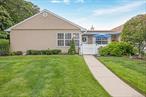 Located in a sought-after 55+ gated community, this spacious one-level Ranch is the largest end model â€” the Dorcester. Move in ready, this unit has been thoughtfully & tastefully renovated. Enjoy a bright, southern-facing kitchen, an open floor, a private patio for outdoor relaxation, a convenient laundry room, and an attached garage offering both storage and ease of access. This pet-friendly neighborhood offers a vibrant social calendar. At the community clubhouse, join in on parties, card games, and clubs, or take advantage of amenities like the swimming pool, water aerobics, walking groups, tennis, pickleball, and bocce.  Because your home should feel like a vacation everyday ....