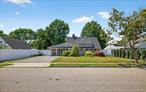 Move right into this Beautiful And Sunny House On a Quiet Tree-Lined Street. Great Neighborhood. Mins. To Hicksville Train, Highways, local transportation, public pool restaurants and shops. . 4 Bedrooms/2 Pristine Bathrooms . Immaculate Eat-In Kit W/Island. Formal Dining Room with sliders that leads to fenced in yard And Living Rm W/Wood Floors, High Ceilings, Skylist & Sliding Door To Backyard. All Modern Appliances W/ Washer & Dryer. Double Driveway, Everything has been carefully maintained and the interior of the house has been freshly painted.