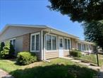 Corner unit Greenbriar with newer vinyl windows. Light and bright. Extra kitchen cabinets for lots of storage. Leisure Village is one of the few retirement communities that is beautifully maintained, offers security and tons of activities, an outdoor pool, golf course and clubhouse - and is still an affordable place to live. So yes, you can retire AND stay on Long Island.