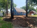 Investor Delight. 4 BRs 1 Bath Cape w/ Large Fenced Yard on Quiet Street. All Cleared Out and Ready for Your Vision. Cash buyers only. Conveniently Located Near Shopping and Public Transportation.