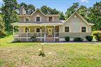 Welcome to this beautiful colonial home, located right in the heart of Cornwall-on-Hudson! This large home was built in 1998, and it provides the perfect opportunity to have peaceful scenery, while also being close to all the town has to offer. From the outside, this property is well landscaped with two separate patio entrances into the home. Upon entry into the home, you are given endless opportunities as you have 11 rooms throughout the entire house!! Through the main entrance, you are greeted with a large living room area with fireplace, this provides a relaxing feel to the home. Moving through you then have a great sized dining room, and well sized eat-in kitchen (well-lit with good space to move around)! On the right-side entrance, you have access to an additional eat-in kitchen, a family room that provides another fireplace, and another large room to that can be used to your liking!! The first floor also has a well sized bedroom, and bathroom! Moving into the second floor, you have three regular sized bedrooms with their own separate closest in each room, there is one regular sized bathroom that can be shared. The second floor also hosts one large primary bedroom with beautiful ceiling views and its own large private primary bathroom! One special item about the second floor is there is an additional large storage space that you can access as needed. Please also note, there is also a very large basement the currently has laundry hookup and access. This basement has a great solid foundation and is very clean, well-kept, and can be perfect for any additional space you need! There is also a shed to the right of the house that provides additional ample storage. In the rear of the property, you also have a well sized deck.Rarely do you come across homes as large as this providing two kitchens, large living spaces, separate entrances, and with ample space for storage all throughout the home!! Inquire today to make this property yours today!