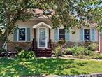 Cozy Cottage. Unique one of a kind. Nice size fenced yard with a back deck off the kitchen. Washer/Dryer hookup. Updated Bath. Spiral stairs to the Primary Bedroom in loft area.  Close to shopping, restaurants and transportation. Close to LIE and Sunrise Ave.