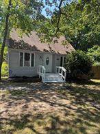Updated Cape Cod with a fully finished basement, located in Hauppauge School District, with Spacious 3 Bedrooms, Hardwood Floors, an eat-in kitchen with Granite Countertops, situated on a 10, 890 sq.Ft Lot( 0.25 Acre)