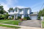 Welcome To This Beautiful Colonial In Farmingdale! This Home Boasts 4 Bedrooms, 3 Full Bathrooms, 2600 SQ Ft Of Indoor Living Space On An Enormous 75X140 Property. Enter This Home Through Your Foyer Leading To An Eat In Kitchen With A Breakfast Nook, Access To the Backyard And Deck. Large Living Room W/Wood Burning Fireplace, Additional Large Bright Family Room With Loft, Access To Garage For Storage, Laundry Room And Separate Entrance To The Side Yard. Second Floor Features A Huge Primary Bedroom With Walk In Closet, Small Study Or Office Space,  Balcony Over Looking Your Beautiful Backyard, Dual Access Full Bathroom, Two Additional Bedrooms, Central Air (Second Floor). Full Finished Basement W/OSE, Tiled Floors, Recreation Room, Office, And A Summer Kitchen. Plenty Of Parking In Your Private 4 Car Driveway With Motion Lights. Cool Off In Your Amazing 20X40 In Ground Pool With Plenty Of Space In Your Backyard Oasis Including Outdoor Dining On A Spacious Deck Overlooking Your Sparkling Pool And Garden Area, Perfect For Outdoor Gatherings!