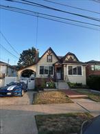 Welcome to this delightful two-family home located in the heart of Howard Beach! This property features a spacious duplex apartment and an additional separate apartment, perfect for extended family or rental income. #1L Duplex Apartment: First Floor: Includes an eat-in kitchen, a formal dining room, a cozy living room, and a convenient half bath. Second Floor: Features a large bedroom, an additional bedroom, a storage room, and a full bath. #1R The additional apartment features an eat-in kitchen, a living room, a bedroom, and a full bath. Additional features include: A full finished basement with a separate entrance and extra storage, gas heating for efficient warmth. a one-car garage and an extra-large private driveway that can accommodate multiple cars, a private yard with an above-ground pool, perfect for relaxation and entertaining. The home will be delivered vacant on title. Situated near Cross Bay Boulevard, youâ€™ll have easy access to a variety of restaurants, shopping, and transportation options. Donâ€™t miss out on this fantastic opportunity!