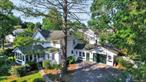 Located in the heart of the historic Village of Goshen, this charming 3-bedroom, 2-bath home blends timeless character with modern comfort. Set on a corner lot just over a quarter acre, the property is surrounded by mature landscaping and stately trees, offering privacy and beauty in every season.Inside, youâ€™ll find 1, 782 square feet of thoughtfully designed living space. The generous formal living room and dining room are ideal for entertaining, while the denâ€”complete with a cozy wood stoveâ€”invites quiet evenings at home. A bright year-round sunroom and a dedicated office add to the home&rsquo;s versatility. The eat-in kitchen is a cookâ€™s delight, featuring granite countertops, an island, and plenty of space to gather.Hardwood floors flow throughout the first floor, and both bathrooms have been tastefully renovated. A two-car garage, full basement with washer and dryer, and a newly installed roof add convenience and peace of mind.Enjoy all the charm and convenience of village lifeâ€”walk to shops, cafes, and restaurants in the heart of Goshen. This Orange County gem is also home to Legoland, and offers easy access to NYC via the nearby park-and-ride and Rte 17/86 Just a short drive to Woodbury Commons and the Galleria Mall, this location truly has it all.Donâ€™t miss your chance to own a piece of Goshenâ€™s storyâ€”schedule your showing today!