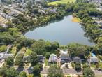 Welcome to East Meadow Living! This expanded split-level home offers a rare blend of comfort, convenience, and natural beauty. The backyard opens to a protected bird sanctuary and private pondâ€”maintained by the local municipalityâ€”creating a serene backdrop that can be enjoyed year-round from inside or outside the home. Itâ€™s the perfect setting to relax, entertain, and connect with nature.Come inside to see vaulted ceilings in the living room, a formal dining room, and a spacious eat-in kitchen designed for everyday living and gatherings. With 4 bedrooms and 3.5 bathrooms, thereâ€™s room for everyone, plus a partial basement, a little attic space, and the potential for an accessory dwelling unit (with proper permits) for extended family or guests.This home also features leased solar panels at approximately $105/month, offering both energy efficiency and cost savings. There&rsquo;s a wide driveway which can provide parking for multiple cars alongside a 1-car garage, and street parking, too.Located in a sought-after neighborhood, youâ€™ll enjoy easy access to parkways, shopping centers, public and private schools, universities, medical facilities, houses of worship, LIRR, Buses, and beautiful local parks. Popular beaches, Queens, Manhattan, and Suffolk County are all just minutes away.Discover why so many people love East Meadowâ€”and why you will, too. Make this home yours while you can!