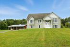 Charming Raised Ranch on Nearly 2.5 Acres with Mountain Views, Pole Barn & Wineries NearbyNestled in a peaceful country setting near the scenic Shawangunk Mountain Ridge, this beautifully maintained three-bedroom, two-and-a-half bath raised ranch offers the perfect blend of comfort, style, and functionality. Surrounded by nature and just minutes from hiking, biking, lakes, and trails, itâ€™s an ideal retreat for outdoor enthusiastsâ€”and wine lovers will appreciate the renowned Hudson Valley wineries just around the corner. Step inside to find gleaming hardwood floors throughout, recessed lighting, and a bright, open layout. The spacious master suite boasts its own private bathroom and a walk-in closet. A finished attic loft space adds versatilityâ€”perfect for a home office, guest room, or creative studio. Downstairs, the finished basement offers a large bonus space with a half bath and an additional walk-in closet area, making it perfect for guests or a recreation room. The home also includes a convenient washer-dryer hookup and an attached two-car garage.Outside, enjoy nearly 2.5 acres of tranquil land along with a 1, 500 sq. ft. pole barnâ€”ideal for a workshop, storage, hobby space, or even housing animals. Whether youâ€™re looking to relax in a peaceful setting, explore the beauty of the nearby mountains, or tour the areaâ€™s charming vineyards, this property offers it all.