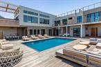 Incredible New Construction Ocean & Bay View Home with Pool!Welcome to your dream coastal retreat in Ocean Bay Park, Fire Island! This stunning brand new construction bay view home for sale boasts 5 spacious bedrooms, 4 full bathrooms, and 2 half bathrooms across two floors, offering over 3, 600 square feet of luxurious living space. Properties of this size and scale are extremely hard to come by on Fire Island. Set back on a massive 11, 803 SF lot, this home lives large! The interior is immaculate, featuring top-of-the-line finishes, high ceilings, and an abundance of natural light. With 2 luxurious bedroom suites on the first level, and 2 additional bedrooms as well as the grand ownerâ€™s suite on the second floor, this home can accommodate an extended family. The primary bedroom has a wall of glass overlooking the bay, a huge walk in closet, balcony access, and an oversized spa bathroom with freestanding tub, walk in shower, dual sinks, and a separate water closet. The expansive great room is perfect for relaxing and entertaining with soaring 13â€™7â€ high ceilings and stunning views of the Great South Bay. The modern gourmet kitchen is a chef&rsquo;s delight, complete with high end appliances, a large center island, and plenty of counter and storage space. Enjoy dining alfresco while looking out over the bay on the large deck with pergola and built in outdoor kitchen, just off of the great room. There are laundry rooms and powder baths on both levels for your convenience.Step outside to your own private oasis, where you&rsquo;ll find a massive 30â€™ X 18â€™ heated salt water swimming pool and over 4, 000 square feet of decking, including a screened in porch, covered outdoor area, and roof deck with breathtaking 360-degree views from bay to ocean. Enjoy stunning sunsets from the comfort of your own home, with uninterrupted vistas of the water and surrounding natural beauty. Situated across Bay Walk from a public green space, your unobstructed bay views are protected forever. Walk to the beach in 3 minutes or the ferry in just 1 minute! Conveniently located close to restaurants and the market in Ocean Bay Park or a quick bike ride to downtown Ocean Beach. This is an incredible opportunity to own a one-of-a-kind home in one of the most desirable locations on Fire Island. Don&rsquo;t miss out on the chance to make this brand new construction home for sale in Ocean Bay Park your own private paradise! Sold fully furnished. Affordable flood only $2, 939/ Year!