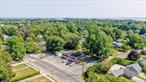 Prime .21-acre corner location at the intersection of Main Road and Oyster Ponds Lane, just steps from the charm and amenities of Historic Orient Village. Zoned General Business, this high-visibility property offers exceptional flexibility for both commercial and residential use under current code. Currently home to â€œThe Candymanâ€â€”a beloved, third-generation family-owned candy, food production, and retail store totaling 2, 695 sq ftâ€”this turn-key operation presents a rare opportunity to step into a nearly world-famous brand with an established customer base and rich local history. Perfect for entrepreneurs seeking to expand their portfolio or launch their first business. Beyond its current use, permitted options include retail stores, wholesale businesses, two-family dwellings, wine-related ventures, and small-scale baking or food processing operations. With its unmatched location, flexible zoning, and deep-rooted community presence, this Orient landmark is an investment opportunity that blends history, charm, and endless potential.