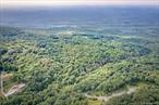 A nature-filled land offering in the charming historic hamlet of Cragsmoor. 31 private acres, once part of the 350- acre estate called Chetolah owned by the artist George Inness Jr. is ready for its next owner. The property is located on-top the Shawangunk mountain range with multiple land preserves, the largest being 5000-acre Samâ€™s Point which is hiking distance from the parcel. With some selective tree clearing there would be stunning south and south-west views. A soothing stream called the Platte Kill that is flanked by rhododendrons and meanders through the lower portion of the property is an ideal spot to place a gazebo and enjoy the many dipping pools. An old roadbed is still intact and usable when considering possible house sites. There is frontage stretching on both Cragsmoor and Vista Maria roads. There are multiple scenic spots for homesites that offer privacy and serenity. Within 2 hours of the GW bridge makes this a great weekend retreat or use full time.
