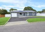 Just listed in the desirable Parklands section of Holbrook, this stunning 4-bedroom, 2-bathroom ranch home with an open-concept is perfect for entertaining. This home is featuring all new windows, flooring, sheetrock, energy-efficient systems and more all updated in 2024. The thoughtful layout includes a convenient mudroom with side entrance and additional laundry space, while each bedroom offers individual climate control with its own mini-split system and ceiling fans for ultimate comfort. The home&rsquo;s energy efficiency is truly exceptional, featuring a state-of-the-art Navien system that delivers continuous hot water while significantly reducing utility bills through its environmentally friendly, low-maintenance design. Brand new Anderson windows throughout the home complement the custom front door and oversized sliding door that opens to the backyard. Six Bosch mini-splits provide heating and air conditioning with individual room temperature control, with living space units discretely mounted on ceilings. Solar panels were installed to further reduce energy costs, making this home as economical as it is beautiful. Storage and functionality abound with large closets in every bedroom, including walk-in closets in three bedrooms, plus a large pantry closet and versatile bonus room that can serve multiple purposes. The laundry room features a built-in auto-sensing dehumidifier, while the large attic space spans the entire house and includes electric and pull-down stairs for easy access. The kitchen awaits your personal finishing touches to complete this remarkable home transformation. The underground utilities and sewers are in this desirable Parkland community. Located close to public transportation, LIRR, MacArthur Airport, shopping, restaurants, parks, and top-rated schools in the Sachem School District.
