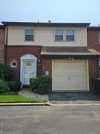 Move right into this two-level townhouse featuring a formal living and dining room, an updated kitchen with granite countertops and stainless steel appliances.The home offers three spacious bedrooms and 2.5 bathrooms, including a primary suite with a walk-in closet.Enjoy the convenience of a washer and dryer on the main level, an attached garage, and an additional assigned parking spot.Close to shopping and transportation.