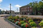 Spacious apartment in the heart of the Village of Goshen immediately available. Beautiful views of the fountain and gardens. Walking distance to all your favorite village spots! This unit features hardwood floors throughout. The open floor plan is a great space to enjoy with your family and friends. There&rsquo;s even a private balcony overlooking a quiet backyard. This layout will work for a variety of tenants. Need to live and work-from-home? This unit could offer that flexibility. Tons of natural light through the space. Close to everything. New laundromat a few blocks away. Shopping, eating, bus stop, police department, Parks, schools, etc are all nearby.