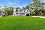Welcome to your modern Hamptons retreat in the coveted Pine Neck community of East Quogue.This thoughtfully crafted new construction offers 4 spacious bedrooms, 3.5 luxuriously appointed bathrooms, and the perfect balance of contemporary elegance and coastal comfort.Step inside to a sun-drenched, open-concept living space featuring soaring ceilings, wide-plank oak floors, and custom finishes throughout. The gourmet kitchen is a chefâ€™s dream with high-end Viking stainless steel appliances, sleek cabinetry, an oversized center island, and an expansive walk-in pantry with built-in cabinetry and shelving. The dining and living areas flow seamlessly to the private backyard, complete with a sparkling inground pool, beautiful patio, and lush landscapingâ€”ideal for summer entertaining.The first-floor primary suite is a tranquil escape with a spa-like bath, walk-in closet, and its own washer/dryer. Upstairs, youâ€™ll find three additional bedrooms, including a second en suite, plus a spacious landing perfect for a home office or lounge, and an additional laundry room for convenience.Located on a quiet street just moments from the bay, marinas, and village shops, this property delivers the rare combination of style, location, and lifestyle. As a Pine Neck resident, youâ€™ll enjoy deeded beach access and the relaxed, year-round charm of Hamptons coastal living.