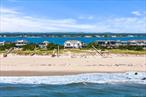 Set on &#177;1 acre with 100 feet of direct ocean frontage, this shingled Post Modern has been renovated and reimagined for today&rsquo;s Hamptons living. Light-filled interiors feature open living and dining spaces anchored by a fireplace, a sleek new kitchen, and four bedrooms all with water views, including two oceanfront suites with private balconies. Outdoors, a heated gunite pool, expansive mahogany deck, and private beach walkway create a true beachfront retreat. With a rare right-of-way to the bay, this property offers the ultimate Hamptons lifestyle, sunrise to sunset.