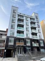 Flushing Newly-Built Elevator Condominium â€“ Spacious 2-Bedroom, 2-Bathroom (1, 002 sq. ft.) condo featuring 2 bedrooms, 2 bathrooms, and a huge private balcony. The home boasts brand-new marble floors, a bright south-facing orientation with excellent natural light, and a practical layout.Enjoy the convenience of a dishwasher, washer & dryer in-unit. Location is unbeatable: just a 7-minute walk to Flushing Main Street and only 2 minutes to Murray Hill train station.With a 15-year 421-a tax abatement, property tax is just $480/year, and the low common charge of $420/month makes this an outstanding value.? A must-see opportunity for modern, comfortable living in the heart of Flushing!