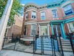 Classic and timeless barrel-fronted brick semi-detached two-family on landmarked Manida Street in Hunts Point. Each unit offers 3 large bedrooms with separate living and dining rooms. The ownerâ€™s unit features an open kitchen with island, granite counters, stainless appliances, updated bath, and new wood floors. Private fenced backyard ideal for pets with space to unwind. Just a 5-minute walk to the 6 train at Hunts Point Ave and only a 30 minute ride to Grand Central. Billions in public and private investment, from The Peninsula to the Access Improvement Project and the Regional Food Hub, are transforming Hunts Point, positioning the neighborhood for rapid growth and appreciation. Step into one of Hunts Pointâ€™s finest homes with high future upside.