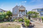 Location, Location, Location! Beautiful waterfront property located on Strong&rsquo;s Creek Canal in the Venice of Long Island section of Lindenhurst. House redone in 2012/2013 and raised 13 feet with 3 stories, 2 wrap around decks and an exterior elevator that brings you from the lower wooden deck to the upper composite deck and main living area. The beautiful interior features magnificent picture windows; bringing in lots of natural sunlight, cathedral ceilings, an updated EIK with maple cabinets, ss appliances and access to the upper deck. The spacious primary bedroom has 2 picture windows with views of the canal, 2 custom closets and space for king sized furniture and then some! The full unfinished basement adds a tremendous amount of storage with sectioned off areas, access to the outside and overflow for parties. The basement offers endless opportunities with multiple means of egress and a work bench for those who are handy or want to become handy! The leased solar panels provide energy savings and efficiency; there is a full house surge protector, a newer hot water heater and new Gas boiler, new pipes and wiring, 2 updated electric panels and 19 vents throughout the house to keep the flood insurance low. The garage with soaring ceilings fits a 21 ft boat with a trailer. With 50 feet of bulkhead and views like no other, this fabulous house is the Just Right house for boaters, entertainers and just about anyone who loves nature, parties and being on the water. This house truly has it ALL! Located within close proximity to schools, parks, stores, restaurants, places of worship and anything you need, this house is just waiting for its next home owners who will love this house as much as the current homeowner&rsquo;s obviously do.