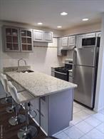 Fully renovated 2 bedroom one bath condo, in Throggs Neck walk in level condominium with assigned parking, safe secure building with private entrance, close to all. Excellent starter or for empty nester. low taxes and maintenance.
