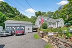 Beautifully updated 3 Br, 2 Bth Cape with extensive upgrades inside and out! Both the home and pole building garage feature brand-new roofs with full ice shield protection. Exterior enhancements include new vinyl cedar shake siding with 1 insulation, copper flashing on the chimney, and a new shed designed to match the homeâ€™s exterior.Enjoy outdoor living on the stunning wraparound Trex deck with contrasting border design, white vinyl railings, and pressure-treated framing. The property also includes a brand-new sidewalk, underground drainage system, and 6 gutters throughout.Interior highlights include a newly added master suite featuring a luxurious bathroom with Italian tile, glass shower, vanity, and modern LED lighting. The original bath has been refreshed with a Bath Fitter system, vinyl ceiling, and exhaust fan. Additional bedrooms feature deck access through new exterior doors. The new addition offers a 1.5-ton ceiling-mounted A/C & heat pump, decorative ceiling fan with remote, and LED lighting. The living room boasts a cozy gas fireplace with remote and log set. Central air conditioning is also included.Additional features include a 22kW whole-house generator with automatic transfer switch, three 100-gallon propane tanks plus a dedicated 60-gallon tank for the fireplace, copper roofing on the bay window and front porch, retucked chimney with concrete and new copper flashing, real brass exterior light fixtures, recently replaced windows, new foundation doors in the addition, two sheds, a large container for storage, and a matching exterior shed.This home is truly move-in ready with premium upgrades and attention to detail throughout!