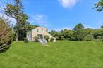 Step into the timeless charm of this historic 1800s farmhouse, originally built by Sea Captain Rose, set on 2.54 acres in the coveted North Sea community of Southampton. Located just minutes from Southampton Village and a short distance to bay beaches, Strong&rsquo;s Marina, and Big Fresh Pond Recreation Area, this one-of-a-kind property offers the perfect blend of history, nature, and convenience. The farmhouse features 3 bedrooms and 2.5 baths, including two spacious primary suites one on each floor. The first-floor suite includes a private entrance, full bath, and large closets which can be rented out separately from the main house. Inside, you&rsquo;ll find a cozy great room, a classic eat-in country kitchen, formal dining room, powder room, laundry room with modern appliances, and a sunroom that opens to a private deck perfect for entertaining or unwinding in peaceful surroundings. A 2.5-car detached garage/barn provides additional storage or workspace. As a rare bonus, residents enjoy access to a dock slip at a nearby town marina ideal for boating enthusiasts. Whether you&rsquo;re seeking a full-time residence, a weekend getaway, or a distinctive investment in one of the Hamptons&rsquo; most storied and natural settings, 1680 North Sea Road offers a truly special lifestyle.Whether you&rsquo;re seeking a full-time residence, a weekend getaway, or a distinctive investment with strong rental income, in one of the Hamptonsâ€™ most storied and natural settings, 1680 North Sea Road offers a truly special lifestyle.