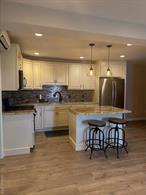 Nicely updated 3 bedroom apartment offering a spacious open concept! This 1000 sq ft rare find can&rsquo;t be matched anywhere in the Village of Highland Falls! Offering a gorgeous eat in kitchen w/ stainless steel appliances, granite counter tops and a granite island with dinette seating! You even have your very own Washer & Dryer! Beautiful tiled bathroom with large rain head shower head! Upgrades include recessed lighting, radiant heating system through out with an ultra high efficiency gas boiler. The boiler also offers on demand hot water which mean super low utility costs for both! This apartment is located one street behind Main Street and is just steps to the center of town. It&rsquo;s less then a 1/2 mile from West Points Main Gate entry. Act fast, won&rsquo;t last!