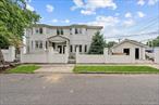 Once in a lifetime opportunity! 219-08 138th Road is a turn key, move in ready custom two family nestled on a beautiful tree lined street of Laurelton/Springfield Gardens border. Sitting on a 95 x 102 lot this 51x60 built two family spans over 3, 246 sq/ft of living space and is a MINI MANSION! Perfect opportunity for buyers looking for space, plus income generating rental property to assist with mortgage payments. This massive two family will captivate you from the moment you arrive with its warm & welcoming energy.Configured as 4 bedroom 2 bath upper unit over a 3 bedroom 2 bath first floor, plus a high ceiling finished basement which can easily be used as a 1st floor/ basement duplex to create additional living space. Both units enjoy expansive sun drenched massive living/dining areas. Beautiful chefs granite kitchens loaded with a full fleet of stainless steel appliances. King sized bedrooms with ample closet space. Primary suite equipped with private en suite and much more! Must see to appreciate. 219-08 138th Road is conveniently located with close proximity to major transportation which makes commuting a breeze. Short blocks to Springfield Blvd, Merrick Blvd, Belt Parkway. Wide array of schools, shopping centers, restaurants, cafes, parks and many other vibrant neighborhood amenities.