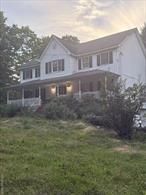 Perched on a hill in the Washingtonville school district sits this stately colonial on 1.3 acres! Step inside from the covered front porch to find hardwood floors throughout all living spaces, and tons of sunlight pouring in to every room! Large EIK features breakfast bar, granite counters, stainless appliances and room for all! Kitchen is open to a charming family room with custom fireplace to keep you cozy all winter while keeping heating bills low! Enjoy entertaining? Huge formal dining room will make all of your gatherings memorable! Lovely open foyer leads you upstairs to 4 bedrooms, including primary with spa-like bath and massive walk-in closet with built-ins! Private back yard features beautiful in-ground pool, fully fenced with all equipment included! Tons of storage (and possibilities!) in the basement too! Some deferred maintenance has been factored in to the asking price, so whether you&rsquo;re an experienced investor or a first-time homeowner seeking a rewarding experience, this home is a golden opportunity! So much house for the money! Bring your vision and build equity by unlocking the full potential of this fantastic home in convenient Hudson Valley location!