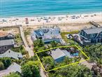 Bright & Airy Beach Retreat with Ocean Views-3rd house from the beach, this 3-bedroom, 1.5 bath Ocean Beach gem offers the perfect blend of charm, comfort, and coastal living. Perched high on the secondary dune this home provides peace of mind, low-cost insurance along with breathtaking views. Located on a family-friendly block, this home has the perfect location for your dream summer getaway. Enjoy the expansive sun-drenched private deck (43â€™x20â€™) for lounging or entertaining, surrounded by mature trees along with a fenced-in yard for added security and privacy. Inside, an open, airy layout with cathedral ceilings and large windows fills the home with natural light, bringing the beauty of the beach right into your living space. Modern kitchen, laundry and bathrooms make this a turnkey property. With the ocean just steps away, youâ€™ll smell the salt air and listen to the waves. The possibilities are endless, as there is room for expansion to add a second floor with panoramic ocean views. Come immerse yourself in the true Fire Island lifestyle. Call today for a private showing!