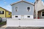 CO OP community - large detached home offering three bedrooms, two full baths, updated, private community, hardwood floors, gas heat, about 1-2 blocks from the water, low HOA. Please note sw ft does not include lower level storage/utility.