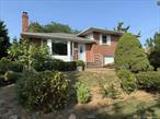 Professional Picture coming soon, Previews are welcome. Conveniently located on the western side of Syosset, this brick split-level home is within walking distance to Robbins Lane Elementary School. Just minutes from major highways, Jericho Shopping Plaza, Whole Foods, banks, and Lifetime Gym.This home features 3 bedrooms and 2 full baths, with UV-block skylights that fill the interior with natural light. All bedrooms are equipped with triple-pane windows for comfort and efficiency. The living area boasts a SmartSun Andersen bay window and sliding door, opening to a spacious deck in the backyardâ€”perfect for relaxation or entertaining.Enjoy low taxes (without STAR exemption credit), making this home an excellent value in a prime location.