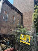 This 20x100 building has Approved plans for 4 Story 12 Units. Please email for more information.
