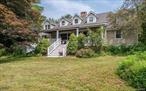 Minutes from Charming Red Hook Village â€“ Private Parklike RetreatTucked away on a serene cul-de-sac in a park-like setting with protected views, this inviting 4-bedroom, 2.5-bath home offers the perfect blend of comfort, craftsmanship, and convenience. A welcoming south-facing covered porch sets the tone for relaxed country living just minutes from Red Hook Village.Inside, the main floor showcases Brazilian cherry solid hardwood floors, while the upper level features warm red oak hardwoods. Thoughtful construction includes 6-inch framing with fiberglass insulation plus 2-inch exterior foam insulation, six heating zones, energy-efficient windows, and Hardie plank siding with solid Azak trimâ€”ensuring beauty, durability, and energy savings.The light-filled living room is ideal for large gatherings, complemented by a cozy family room with a woodstove. The spacious eat-in country kitchen includes a private office nook, perfect for working from home. The first-floor primary suite offers a private bath, while a powder room and laundry add main-level convenience.Upstairs, youâ€™ll find three additional bedrooms, a full bath, and a versatile playroom or art studio. The full walk-out basement features high ceilings and south-facing windowsâ€”ready for finishing or storage.Outdoor living shines here, with a hot tub tucked into a lush garden area, a 1+ acre wireless dog fence within the 5-acre lot, and plenty of space to roam. The property also includes a generator hook-up for peace of mind and an incredible oversized detached three car garage/barn. Prime locationâ€”6 miles to the Taconic Parkway, 15 minutes to Amtrak, 10 minutes to Rhinebeck & Kingston, and close to swimming, hiking, farm markets, and antiquing. Bard College and the Fisher Center are just 10 minutes away, and Hudson is 20 minutes.This is a home designed for comfort, connection, and lasting qualityâ€”your Hudson Valley dream awaits.