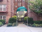 Cozy Jr1/studio, Good move-in condition, it offers living area and a separated small bedroom - . Windowed bath, hardwood floors. There is a Bulk Building Cable Plan $59/mo. Maintenance is $650.87 with Cable included. Located in the Heart of Kew Gardens convenient to E AND F express train, as well as buses, Long Island railroad and ALL Shopping!!!.