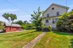 Showings Begin 8/23/25. Charming and well-built older Colonial in the Mahopac School District, filled with natural light and character. Large detached garage with workshop space and second-story storage. The main level of the home features a spacious living room, sitting room with picture window, and a formal dining room with a bay window. The kitchen and mud room open to a patio. Nice details include crown moldings. The upper level includes a bright primary bedroom, full bath, and second bedroom. Full walk-up attic for additional storage. The full, unfinished basement offers laundry, utilities, more storage and a door out. Taxes do not reflect the STAR deduction, available to those who qualify.