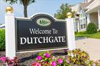 FIRST FLOOR CORNER UNIT IN DUTCHGATEWelcome to comfortable and accessible living in Valley Streamâ€™s 55+ gated community. This rare first-floor corner unitâ€”one of only 28 on the first floorâ€”is semi-detached with an extra window for added natural light and is as close to the clubhouse, pool, and mailbox as you can get. Featuring 2 bedrooms and 2 full bathrooms, the primary bedroom includes an ensuite for added convenience. The efficient kitchen flows into a combined living and dining room for a spacious feel. Practical amenities include an in-unit washer and dryer, a charming front porch, and a rear balcony for private outdoor relaxation. Enjoy gas heating and central air for comfort in any season. The vibrant community offers a clubhouse with an inground pool, billiards, meeting room, gym, and more, creating an active and social lifestyle.