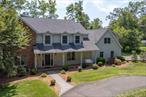 Welcome home! This large colonial style home features 4 bedrooms, 2.5 bathrooms, large eat-in kitchen, dining room, family room, and formal living room. The large bathroom off of the primary bedroom offers double sinks, stand up shower and a jacuzzi. This home offers a 2-car garage, partially finished basement, and large covered front porch. If you love to entertain, look no further. The outdoors offer a large deck, above ground swimming pool, firepit, pergola covered patio, hot tub and a large shed for outdoor storage. Additionally, you will find a circular driveway, paver style walkways, mature plantings and manicured turf. Schedule your private showing today!