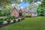 This charming French Country home offers 4 spacious bedrooms, 2 full baths, and 1 half bath, blending timeless elegance with modern comfort across 3, 200 square feet. The first-floor master suite provides convenience and privacy, while Anderson windows fill the home with natural light.The eat-in kitchen boasts stainless steel appliances and flows seamlessly into the gorgeous great room, highlighted by soaring vaulted ceilings, exposed wood trusses, and a floor-to-ceiling stone fireplace with built-in shelving.Additional features include:Two-car garage.Laundry room, complete with shelving.Massive unfinished pristine basement, free from columns â€“ ideal for customization.Walk-in attic â€“ great for storage or potential expansionGated in-ground swimming pool â€“ perfect for summer entertaining.Nine-zone in-ground sprinklers.Three-zone central air & Three-zone natural gas heat.A rare combination of style, comfort, and practicality, this home is ready to welcome its next owners.