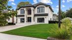 CONSTRUCTION IS COMPLETE !!!!! Welcome to this breathtaking newly constructed Colonial style residence, where timeless elegance meets modern sophistication. Boasting 5 spacious bedrooms and 5 beautifully appointed bathrooms. This home offers an exceptional blend of comfort, luxury and functionality. As you step through the grand entryway, you are greeted by 20 ft ceilings and 2 crystal chandeliers that create a dramatic sense of space and light throughout the main living areas. The open concept floor plan is perfect for family living and elegant entertaining, showcasing a whole house blue tooth sound system, Brazilian Oak wood floors with marble insets, elegant crystal chandeliers and custom wall and ceiling woodwork. The gourmet kitchen features top of the line stainless steel appliances, a convenient pot filler over the gas cooktop, a microwave with convection oven and steamer built in wall unit, a walk in pantry, quartz countertops, custom cabinetry, wood floors and an oversized center island that seats 4. The kitchen flows into an entertaining room with an expansive gas fireplace, stunning sconces and custom lit crystal fixtures with built in shelving encasing the entertainment wall. You will find a first floor guest bedroom with a full bathroom conveniently opposite the bedroom. The second floor features a premiere bedroom with spa bathroom, his and her closets, custom ceiling and wall woodwork, crystal fan light and a gas fireplace opposite the bed. The second floor has 3 more bedrooms, 2 full baths, a separate laundry room with new washer and dryer and a double door linen closet completes the top floor. There is also access to a pull down ladder to the attic. Outside the home you will find new landscaping, an unattached garage, full property underground sprinkler system, weatherproof security camera system , ring door bell and modern lighting .This brand newly built home has a full unfinished basement but does have a full finished bathroom with crystal lighting and large shower. The lowest level features a private entrance via a stone staircase back up to the backyard. Situated on a beautiful landscaped piece of property in a very quiet neighborhood, 1 street from Woodbury road, lots of shopping, dining, food markets and public transportation....this Colonial work of art comes with sought after features and masterful craftmanship.  Nothing has been left out of this stunning new home. Make 71 Cedar Street your forever home!
