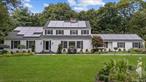 Welcome to this magnificent & elegant Center Hall colonial!! The large driveway with fountain leads you up to this home, professionally landscaped with park like grounds. This approximately 3600 sq ft home features 14 rooms with 5 bedrooms, 3 full baths and 1 half bath. The entry foyer leads you to a living room with wood fireplace, then onto the formal dining room with bay window and crystal chandelier. The large kitchen has stainless steel appliances, granite counters, beautiful custom wood cabinets, generous seating area along with wet bar & wine refrigerator. There are 2 ovens, and a subzero refrigerator with custom cabinetry. Guest bedroom /maid quarters with full bath. Next lower level leads you to a beautiful family room with custom built gas fireplace, 1/2 bath and French doors leading to the patio with hot tub. Next level up leads you to the Master bedroom with stained glass window and crystal chandelier, wood floors, custom built cabinetry, double his & hers closets. Full bath with shower recently updated to an Artistic Italian style bath, double sinks hand painted along with custom cabinetry. 3 bedrooms with wood floors and 1 bedroom converted to a custom-built walk-in clothes closet. Full bath as well. Full finished basement with ceramic tile floor. The backyard is fully fenced. Outside is a beautiful salt water heated inground pool with new pool pump & filter as well as new Cambridge pavers all around pool & patio. New lighting in pool area. Koi pond and waterfalls as well as a beautiful gazebo to relax in!  New roof, gutters with leaf guards, new siding, new tuff shed, custom garage with garage Tek and cabinets. Natural gas lines to BBQ & fire pit. Generac 20KW natural gas-powered whole house generator. Solar panels, 2021 leased, Level 2EV charger in garage. New central vacuum, Security system,  Wifi extender, Alarm system, cedar closet. This exceptional home is a must see!