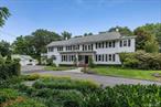 Originally built in 1861 and thoughtfully relocated from Scudders Lane, this one-of-a-kind residence blends historic character with quiet sophistication. Set on a private, tree-lined lot, the home offers four bedrooms, three full bathrooms, and two half-baths, along with a sun-filled kitchen featuring a wood-burning fireplace, a formal library, music room, office, and a fully finished basement.The grounds are equally enchantingâ€”lush, secluded, and designed for both relaxation and entertaining. A sparkling pool, koi pond, and charming gazebo invite moments of tranquility, while the bluestone patio with a full outdoor kitchen sets the stage for gatherings. A detached garage and artistâ€™s studio provide additional flexibility for work or creative pursuits.Rich in detail and soul, 10 Eastview Lane honors its past while offering the comfort and elegance of modern living.
