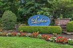 Welcome to 29 Erin Lane at The Lakes at Setauket...a designer-styled pied-a-terre, low-maintenance haven, or retirement villa. This 1-BR, 1.5-bath unit was recently fully renovated and features new appliances/laundry/water heater, natural stone/marble countertops, updated electric/extra outlets, Florida Tile throughout, open floor plan with chef&rsquo;s kitchen (expansive 18-foot center-island, wine cooler, Thermador double oven), granite-top desk with hard-wired printer station/multiple cabinets, BR with en-suite bath/heated floor and separate built-in vanity, gas fireplace, Toto bidet, extensive storage including walk -in closet, and walk-out oversized patio. Low Taxes: $2857 without Star. Total monthly cost (taxes, utilities, HOA) UNDER $1, 000 per month. Rare opportunity to own within this beautifully manicured 56-acre gated community in the Three Village SD, convenient to the LIRR, Stony Brook University, and Port Jefferson ferry. Tax records state 0 square feet. Appraisal report shows 1036 sq ft.