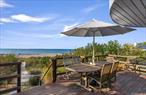 Experience On Gardiner&rsquo;s BayThis extremely interesting multi-family compound on one acre with 102&rsquo; of sandy beach features the most magical sunsets. With panoramic views across Gardiner&rsquo;s Bay to the North Fork and Connecticut. The combination of dwellings has a total of 7 bedrooms, 4.5 bathrooms, garages, heated lap pool, and new hydro action I/A septic system. Driveway access to the waterfront primary residence is found off Flaggy Hole Road where there is a two-car garage and storage area. The two-family waterfront house is on three levels, the ground level is a single and separate apartment with a full kitchen, dining area, living room, 2 bedrooms, 1 full bathroom and sliding glass doors to the beach. The second and third floor respectively is the main residence with open living and dining space and sliding glass doors that showcase the dynamite views. There are 3 bedrooms, 2 full baths, and balconies overlooking the bay and the pool area. From Gallatin Lane there is a separate legal dwelling with 2 bedrooms, 1.5 bathrooms and a full basement. The ground floor has an open living concept with a fireplace and powder room. The second floor has a generous bedroom with a balcony and views, second bedroom, full bath, laundry and detached garage. This property offers a rare experience on Gardiner&rsquo;s Bay. Now with architectural renderings by Christopher Arelt of Nautilus Architect.