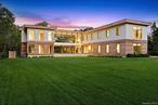 Set on more than 3.7 acres in North Haven, this brand-new estate combines architectural elegance with the relaxed spirit of Hamptons living. Thoughtfully designed to frame open views of Fresh Pond and Sag Harbor Bay, the property offers both a sense of privacy and easy access to the best of the area - just minutes from Sag Harbor Village, beaches, marinas, and waterfront dining. The 8, 960 SF residence unfolds across three levels, blending striking scale with comfortable flow. A soaring double-height entry sets the tone, leading to a sunlit great room with walls of glass and a stone fireplace. The chef&rsquo;s kitchen, outfitted with marble counters, a full butler&rsquo;s pantry, and high-end appliances, connects seamlessly to indoor and outdoor dining areas through electronic glass doors. The main level also features a junior primary suite with spa-style bath, an additional living room with fireplace, home office or sitting room, laundry, mudroom, and access to the attached two-car garage. Upstairs, the primary suite enjoys sweeping water views, dual walk-in closets, and a resort-like bath with soaking tub and steam shower. A private sitting room or office with full bath extends the suite. Five guest bedrooms, each with en-suite baths and walk-in closets, share the second floor alongside a lounge with wet bar and terrace overlooking the property. The grounds are designed for leisure and entertaining, anchored by a 20&rsquo; x 50&rsquo; heated saline pool with integrated spa. A separate 320 SF pool house with kitchenette and firepit adds convenience and charm. Expansive rolling lawns, limestone patios, mahogany terraces, and the possibility of adding a tennis or pickleball court make the outdoor spaces as versatile as they are beautiful. Mature landscaping and perimeter hedges ensure peace and privacy. 27 Fresh Pond Road offers the rare combination of cutting-edge design, resort-level amenities, and a coveted North Haven location The main level spans 4, 720 SF and welcomes you with a dramatic double-height foyer and custom white oak floating staircase. At its heart is an open chef&rsquo;s kitchen with marble counters, a center island with seating, all high-end appliances, and a full butler&rsquo;s pantry. Electronic glass doors seamlessly connect the dining area to two covered porches, while the soaring great room boasts floor-to-ceiling windows and a stone-clad fireplace. This level also includes a junior primary suite with porch access, dual walk-in closets, and a spa-like bath, plus a sitting room/office, second living room with fireplace, powder room, laundry with dual washer/dryers, mudroom, and direct access to the garage. Upstairs, the 4, 240 SF second level offers a private primary suite with water views, two walk-in closets, and a luxurious bath featuring a soaking tub, steam shower, dual vanities, and private water closet. A connected sitting room or office includes its own full bath. An upper lounge with wet bar opens to a terrace overlooking the grounds, while the guest wing provides five additional en-suite bedrooms, each with walk-in closets. A second laundry room completes the level. Designed for entertaining, the 320 SF pool house offers a kitchenette, two outdoor seating areas, and a built-in gas firepit. The outdoor setting is anchored by a 20&rsquo; x 50&rsquo; heated saline gunite pool with integrated spa, surrounded by limestone patios, mahogany-covered terraces, an expansive rolling lawn, and room to add a tennis or pickleball court. The grounds are enhanced with lush landscaping and mature hedges for privacy. With its thoughtful design, resort-style amenities, and tranquil North Haven setting, 27 Fresh Pond Road is the perfect retreat for year-round living or an elevated seasonal escape.
