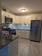 Remolded 1# Floor apartment with Patio, Livingroom, All updated Kitchen, Dining area, remodel Full Bath, plenty of street parking in front of unit