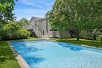 Welcome to 148 Monroe Drive, an idyllic retreat nestled in the scenic Hither Hills of Montauk, New York. Imagine waking up in this four-bedroom, two and a half bathroom haven, where the tranquility of nature meets modern comforts. Picture yourself strolling through the lush yard to the private ocean beach, a feature exclusive to residents of this distinguished neighborhood.We promise you an unparalleled living experience, offering both privacy and community. This corner lot property ensures your peace and quiet, while also providing access to two shared spaces that foster a warm and welcoming environment.The house itself is a testament to thoughtful design and quality craftsmanship. Wide plank flooring runs throughout, adding a touch of rustic charm to the comfortable layout. Two fireplaces add to the cozy atmosphere, perfect for those chilly winter nights. The outdoor amenities are equally impressive with expansive decking, a private pool, hot tub, a beautiful pool house, and an outdoor shower.But don&rsquo;t just take our word for it. The property&rsquo;s great rental history speaks for itself, a testament to its desirability and enduring appeal. AC in home and pool house.Now, it&rsquo;s time for you to make a move. This is more than just a house; it&rsquo;s a lifestyle. A place to make memories, to enjoy the best of what Montauk has to offer, and to call home. So, why wait? Take the first step towards your new life at 148 Monroe Drive.